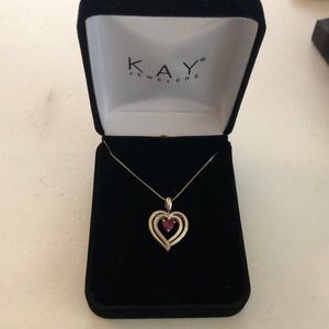 Kay Jewelers heart shaped necklace. Reversible.